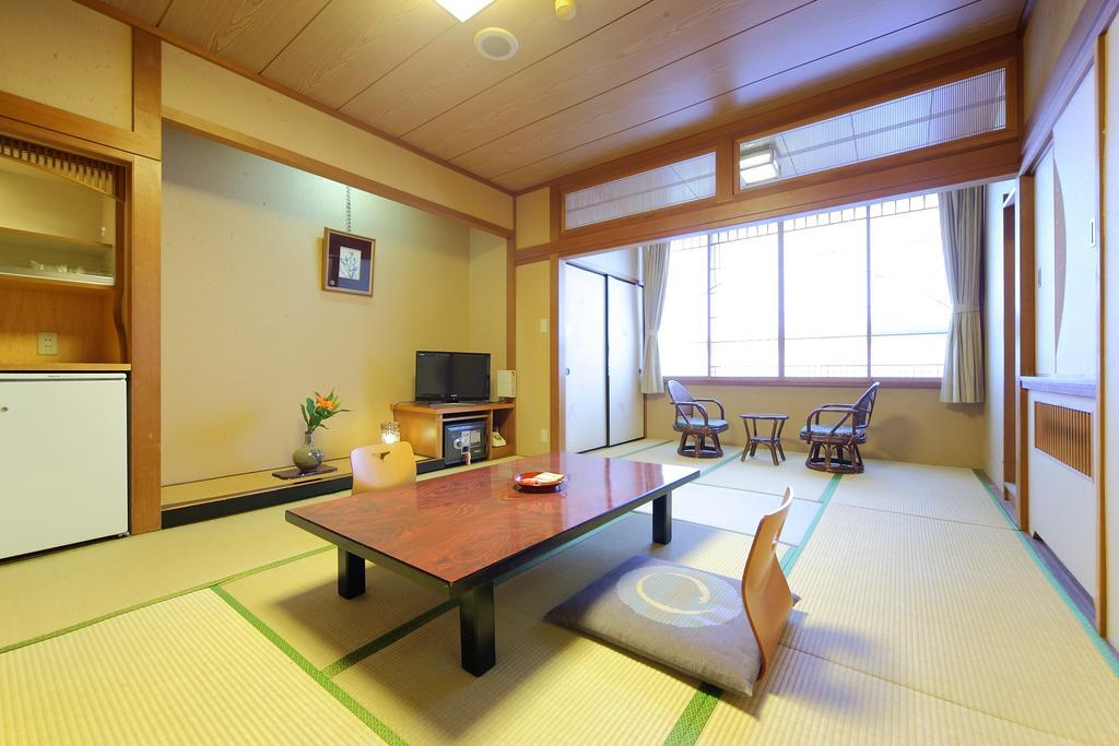 Awara Onsen Hot Spring Koubou Gurabaatei Hotell Rum bild