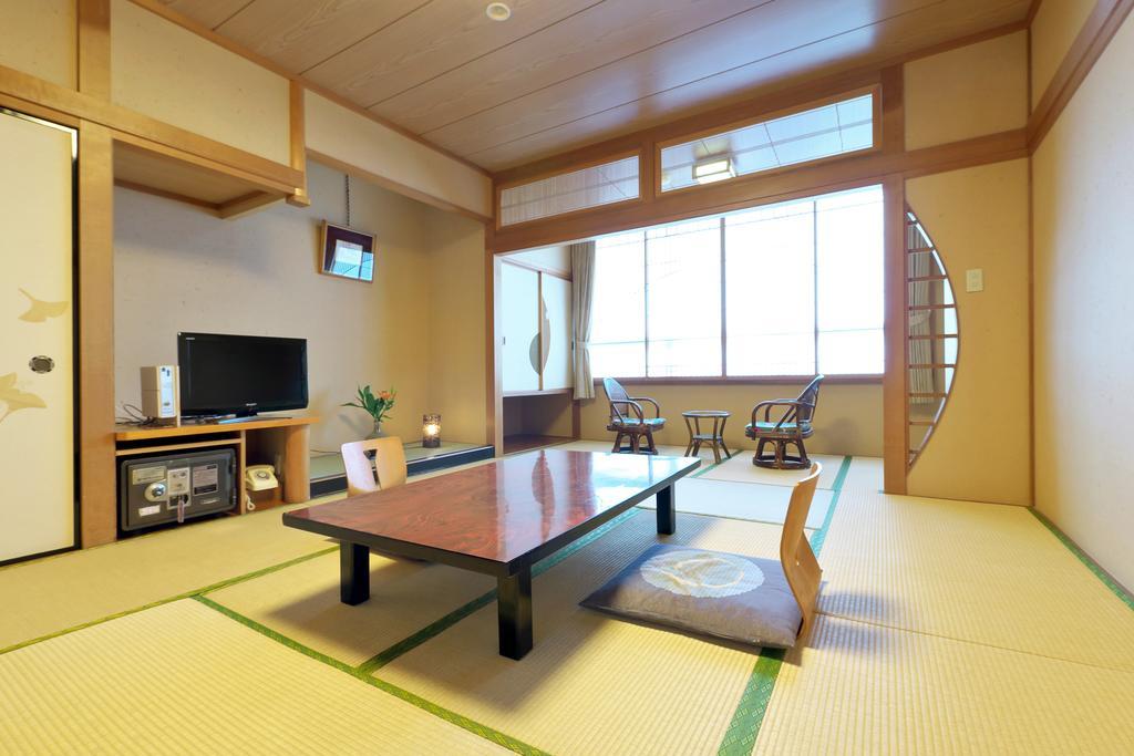 Awara Onsen Hot Spring Koubou Gurabaatei Hotell Rum bild